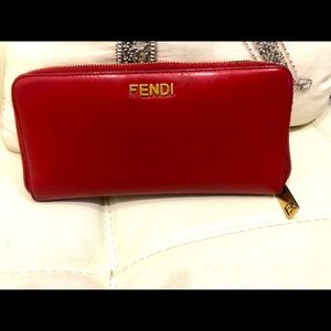 Authentic Fendi red leather wallet with gold sturdy zip around zipper 9.5”LX5” W
